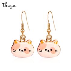 These adorable Cartoon Cat Earrings bring a touch of fun and whimsy to any outfit. Their design symbolizes playfulness and creativity, making them perfect for those who love to express their unique personalities. Wear them to bring a smile to your face and spread joy to those around you!   - Brand: Thaya  - Material: Alloy  - Size: 4*1.8cm  - Weight: 2g  - Style: Cat  - Gender: Women's Party Favors For Women, Cartoon Kitten, Aesthetic Funny, Animals Lover, Earrings Kawaii, Spotted Cat, Women Friends, Earrings Aesthetic, Kawaii Aesthetic