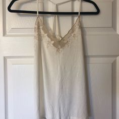 Aeo Soft&Sexy Tank With Floral Crochet Detailing At Top. Loose Fitting And In Perfect Condition. Nwot, Never Worn White Camisole With Built-in Bra For Night Out, White Stretch Lace Top Camisole, White Lace Top Stretch Camisole, Chic White Backless Camisole, White Cami Tank Top For Night Out, White Camisole Tank Top For Night Out, White Stretch Camisole For Night Out, White Camisole Top For Night Out, White Spaghetti Strap Tank Top For Night Out