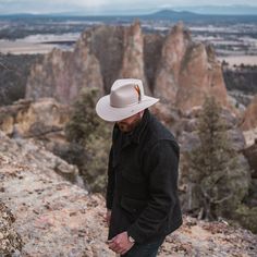 The Dune 5X Outdoor Hat is constructed of 5X fur felt and features a pinchfront crown, interior comfort sweatband, bound edge brim and a 2-ply self matching hat band with feather accent. 5X Quality Fur Felt Made in U.S.A. Brim: 3-1/4” Crown: 4-1/4" 2-Ply Cord Hat Band Made in U.S.A. Outback Hat, Outdoor Hat, Western Style Boots, Men’s Boots, Wide Trousers, Outdoor Hats, Thigh Boot, Style Boots, Hat For Man