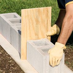 Working with Concrete Block Diy Concrete Wall, Outdoor Upgrades, Concrete Block Retaining Wall, How To Lay Concrete, Concrete Block Foundation, Diy Retaining Wall, Building A Retaining Wall, Alternative Housing, Concrete Block Walls