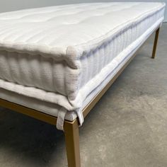 the mattress is made up and ready to be placed on it's standup