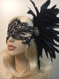 "Black Lace Masquerade Mask with Feathers and Crystals, Women's Lace Mask, Masked Ball, Wedding Masquerade Masks, Bridal Wedding Mask Beware of cheap imitations that use glue! This is an original design by IceGreenEyes. Stiffened and lace mask will not sweat your face like the cheap plastic ones. The mask is also shaped so you have lots of room around the eyes instead of a skinny slice. These masks are hand stitched, not held together with sticky glue that will heat up and fall apart before the Black Masquerade Mask For Wedding Carnival, Wedding Masquerade Mask With Rhinestones, Formal Mardi Gras Masquerade Mask, Black Wedding Headpiece For Carnival, Elegant Wedding Masks, Elegant Fitted Masquerade Mask For Costume Party, Carnival Rhinestone Masquerade Mask, Elegant Fitted Masquerade Mask For Carnival, Elegant Fitted Masquerade Mask For Mardi Gras