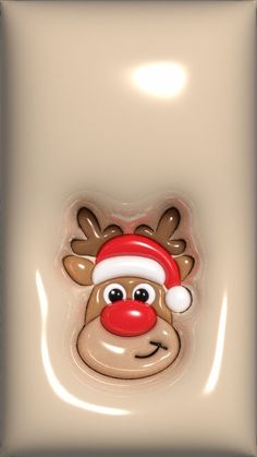 a reindeer face with a santa hat on it's head is shown from the side