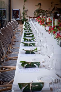 the long table is set up with place settings