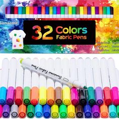 the 12 colors of fabric pens are shown in front of an assortment of other colored markers