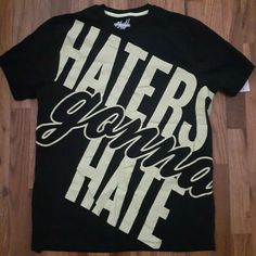 Brand New With Tags Haters Gonna Hate T-Shirt In A Size Large Ready To Be Shipped! Shirt Is Black With Large Almost Neon Yellow Lettering. Approximate Measurements Are Laying Flat And Unstretched- Shoulder: 19in., Chest: 22.5in., Length: 29in. Yellow Hip Hop Top With Graphic Print, Yellow Graphic Print Hip Hop Top, Yellow Urban Tops With Logo Print, Black Spring Fan Merchandise Tops, Yellow Logo Print Tops For Fan Merchandise, Yellow Logo Print Top For Fans, Haters Gonna Hate, Hair Clothes, Neon Yellow