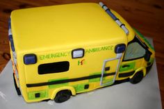 there is a cake shaped like a ambulance