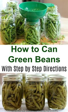 jars filled with green beans sitting on top of a table