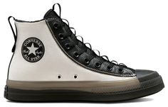 a pair of black and white converse sneakers