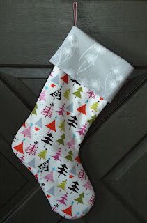 a christmas stocking hanging on a door