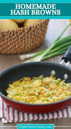 a skillet filled with hash browns on top of a table