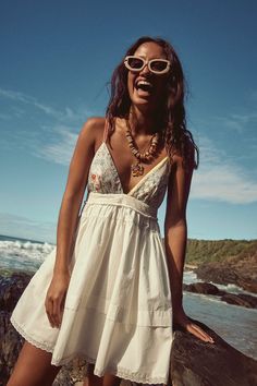 Cup Of Love Mini Dress | Free People Free People Floral Dress, Free People Vibes, Cotton V-neck Mini Dress With Lace Trim, Daywear Backless Dress With Lace Trim, Feminine V-neck Dress With Adjustable Straps, White V-neck Dress With Straps, Bohemian Brunch Dresses With Straps, Bohemian Spaghetti Straps Mini Dress For Daywear, Beach Dress With Lined Bodice