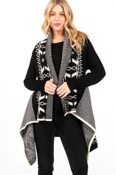 Stay cozy and stylish with this Aztec Pattern Winter Vest in One Size. Made from 57% Acrylic, 28% Polyester, and 15% Nylon. Perfect for chilly days! Nordic Style Warm Sweater For Fall, Warm Nordic Sweater For Fall, Cozy Fit Soft Knit Outerwear For Layering, Cozy Gray Winter Outerwear, Casual Outerwear With Fair Isle Pattern, Casual Fair Isle Pattern Outerwear For Layering, Black Jacquard Knit Outerwear For Fall, Black Jacquard Knit Casual Outerwear, Casual Fair Isle Outerwear For Layering