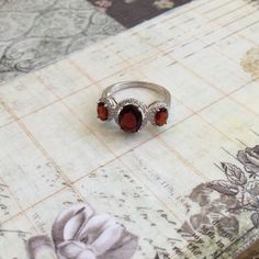 Now, This Is One Of My Favorite Cocktail Rings In My Collection. It. Is. Flawless. Seriously Unbelievable, And I Cannot Stress This Enough. Crafted In Solid .925 Sterling Silver With An 18k White Gold Overlay, It Contains 1.98ct Of Red Garnet And White Sapphire. Weight Is 3.04 Grams. Size 9. Silver Eternity Ring, Dainty Wedding Ring, Blue Stone Ring, Gold Overlay, Emerald Cut Diamonds, Diamond Fashion, Red Garnet, White Sapphire, Blue Rings