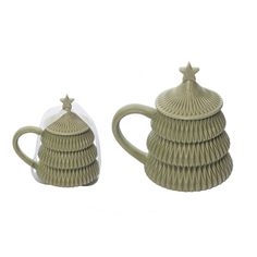 two ceramic teapots sitting next to each other