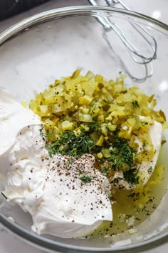 the ingredients for this dish are in a glass bowl