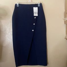 Navy Blue Crossover Skirt With Bling Buttons And Back Zipper. The Waist Measures Approximately 14 Inches Across And The Length Is Approximately 32 Inches Fitted Denim Blue Zara Skirt, Elegant Blue Zara Skirt, Zara Blue Long Skirt, Zara Blue Skirt With Pockets, Zara Blue Lined Mini Skirt, Crossover Skirt, Long Knit Skirt, Leather A Line Skirt, Blue Non-stretch Denim Skirt With Button Closure