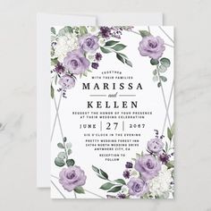 an elegant floral wedding card with purple flowers and greenery on the front is shown