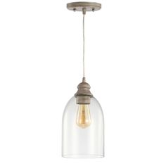 a clear glass light hanging from a ceiling fixture