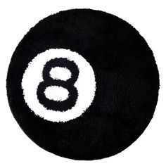 a black and white number eight ball on a white background