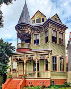 an old victorian style house with a turret