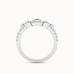 The 3-Tier Smitten Ring is a symphony of diamonds, meticulously orchestrated to create a captivating visual masterpiece. Each tier features a unique arrangement of round diamonds, with larger diamonds taking center stage, elegantly framed by smaller diamonds. It strikes the perfect balance between boldness and subtlety, making it an ideal choice for those looking for a diamond ring for an anniversary. Replica Jewelry, Diamond Stacking Rings, Vs Diamond, Diamond Settings, Center Stage, Stacking Ring, Diamond Clarity, Stacking Rings, White Gold Rings