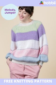 a woman wearing a colorful sweater and pink pants with the words melody jumper on it