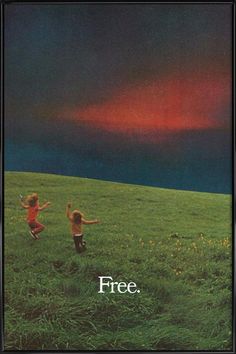 two children running across a green field with the sky in the background and an advertisement for free