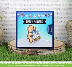 a happy winter card with a bear holding a snow globe in front of sheet music