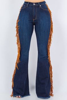 Look like you rodeoed your way to wardrobe perfection in these fringe bell bottoms! Made with a premium soft stretch denim for a great fit and dark blue for badass vibes, these 34" inseam jeans have sides fringe detail and functional pockets front and back. Saddle up for style.This garment is MADE TO ORDER and is Final Sale. Style: high rise Silhouette: bell bottom Embellishment: fringe tassels Length: full length Closure: zipper, button Made In: USAFabric Contents: 52% RAYON26% COTTON21% POLYES Cowgirl Fringe Pants, Trendy Fall Flare Jeans With Frayed Hem, Trendy Dark Wash Flares With Frayed Hem, Dark Wash Flares With Frayed Hem For Fall, Fitted Flares With Frayed Hem For Fall, Trendy Blue Flares For Fall, Fall Denim Blue Flare Jeans With Frayed Hem, Fall Flare Jeans With Frayed Hem In Denim Blue, Fall Wide Leg Bottoms With Fringe