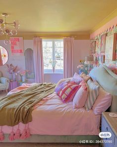 a bedroom decorated in pastel colors and pinks