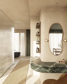 a bathroom with a marble sink and mirror