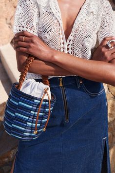 A luxe, new take on the bag that started it all - our signature Lunchpail, now finished with an intricately hand-braided Napa Leather handle, from a centuries old Italian atelier, heralded for it’s world class quality and attention to details. Cesta baskets are handwoven by female artisans in Rwanda, Africa, using locally sourced, renewable resources. Each piece is hand finished in Italy with carefully chosen, sustainable materials. This basket took a master craftswoman over 6 days to weave. 6" Rwanda Africa, Lunch Pail, Jenny Bird, Olympia Le Tan, Craft Bags, Women Artisans, Sustainable Materials, Knit Jacket, Summer 2023