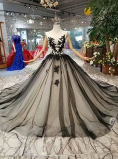 a black and white dress on display in a store