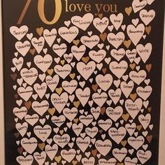 a poster with many hearts on it that says 70 years of love you in gold and white