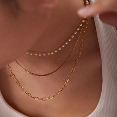 ✦ Complete your everyday look with our minimalist 18K gold-plated pearl layering necklace and earrings. Crafted with simplicity and elegance in mind, these pieces are perfect for adding a touch of sophistication to your casual and daily wear. Designed to seamlessly complement any outfit, they are versatile essentials for your jewelry collection.----------- DETAILS ------------ Color: Gold- Chain Length: 36cm & 40cm & 45cm + 5cm- Materials: 18K Gold Plated, 316L Stainless Steel, Seed Beads*316L S