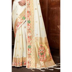 Cream colored saree is made from paithani banarasi silk fabric which is highlighted with beautiful weaving and tassels border as shown. comes along unstitched paithani banarasi silk blouse piece which you can customise as per your design/style. Occasion - You can wear this saree for festivals, functions and ideal for any fashionista. Note:- the actual product may differ slightly in color and design from the one illustrated in the images when compared with computer or mobile screen. Measurements: Saree : Banarasi Silk : 5.5 Mtrs Blouse : Banarasi Silk : 0.8 Mtr Material: Banarasi Silk Stitch Type: Unstitched Occasion: Festive, Sangeet Country of Origin: India Care Guide: Dry Clean White Semi-stitched Paithani Silk Saree, Ceremonial Semi-stitched Paithani Silk Saree, White Paithani, Semi-stitched Yellow Paithani Silk Saree, Embroidered Semi-stitched Paithani Silk Saree, Saree Banarasi, Banarasi Silk Saree, Baby Skin Care, Mobile Screen