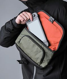 Unleash hands-free convenience with our versatile, compact sling bag. Crafted from durable, waterproof X-Pac VX42 fabric, it's perfect for all your outdoor escapades. Featuring three compartments, including a hidden section for valuables, and a magnetic flap for quick access, this bag is a game-changer for iPad Mini 6 owners and on-the-go pros. Stay organized, protected, and stylish with weatherproof features and waterproof zippers. 4L volume with precise dimensions. Ideal for gamers, entreprene Durable Functional Chest Bag For Everyday Use, Durable Functional Chest Bag, Durable Nylon Chest Bag For Everyday, Outdoor Camera Bag With Functional Pockets, Versatile Chest Bag For Outdoor Activities, Functional Outdoor Camera Bag With Pockets, Rectangular Chest Bag With Functional Pockets For Outdoor, Outdoor Rectangular Chest Bag With Functional Pockets, Rectangular Outdoor Chest Bag With Functional Pockets