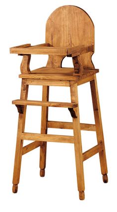 an old wooden high chair on a white background