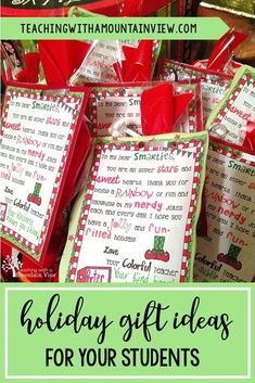 some red and green candy bags in a basket with tags on them that say merry