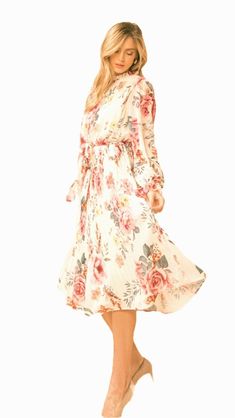 Step into spring with our stunning BEIGE FLORAL MIDI DRESS! This dress features a beautiful floral print on a beige background, perfect for sunny days. The pleated skirt adds a flirty and feminine touch, while the high ruffled neckline and peasant sleeves create a vintage-inspired look. The elasticized waist with self sash tie cinches in at the waist, creating a flattering silhouette. Finished with a back button keyhole closure, this dress is perfect for any occasion. Dress 100% PolyesterLining Peasant Sleeve, Spring Is In The Air, Ruffled Neckline, Pink Floral Dress, High Neck Long Sleeve, Pleated Midi Dress, Beige Background, Hoco Dresses, Spring Wardrobe