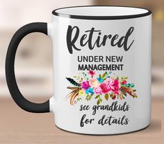 a black and white coffee mug with the words retired under new management see grandkids for details