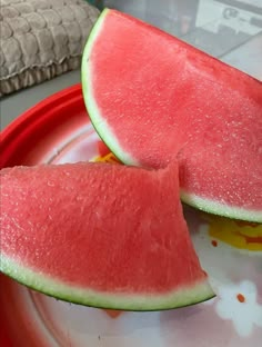 two slices of watermelon on a plate