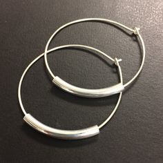 1 1/2 inch Sterling silver hoop earrings. Handcrafted. Simple, classic, timeless. Curved tubes (available in silver, shiny gold or antique gold) are threaded onto 1 1/2 inch diameter handcrafted sterling silver hoops. Earrings Features: * Extremely lightweight! * Measure 1 1/2 inch diameter * Minimalist, Dainty and Unique * Best Sellers, very popular design * Inspired by the one and only Joanna Gaines from Fixer Upper. These seem right up her alley! Plastic backs are provided with every pair and Adjustable Hoop Earrings With Ear Wire, Hypoallergenic Adjustable Hoop Earrings, Adjustable Nickel-free Hoop Earrings, Adjustable Small Hoop Beaded Earrings, Adjustable Small Hoop Earrings Nickel Free, Small Hypoallergenic Metal Hoop Earrings, Nickel-free Hoop Jewelry, Adjustable Pierced Hoop Earrings, Silver Hoop Earrings Medium