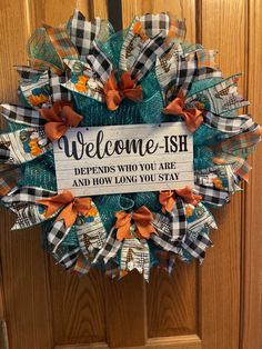 a welcome sign hanging on the front door