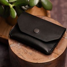 "This pouch wallet/purse this 100% handcrafted in Lincoln, UK. Made from a single piece of high-quality 5/6oz (2.5mm) full-grain leather this rugged yet classic design will keep your coins, cash and card secure.   With optional personalisation, this item is the perfect gift for Birthdays, Father's Day, Mother's Day or Anniversaries especially 3-year wedding anniversaries, LEATHER!  Shire Supply Company uses only the best quality leather, sourced from a UK-based tannery with over 100 years of lea Handmade Leather Wallets For Everyday Carry, Leather Card Holder With Waxed Finish, Minimalist Leather Coin Purse For Gift, Leather Trifold Wallet With Waxed Finish For Everyday Use, Minimalist Leather Coin Purse As Gift, Everyday Leather Bifold Coin Purse, Minimalist Leather Rectangular Coin Purse, Minimalist Rectangular Leather Coin Purse, Leather Card Holder With Waxed Finish As Gift