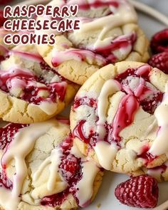 raspberry cheesecake cookies on a white plate