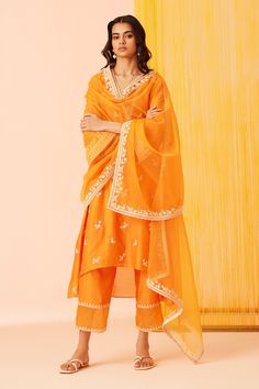 Buy Orange Silk Chanderi Embroidered Dori Deep V Neck Daydream Kurta Set For Women by Sureena Chowdhri Online at Aza Fashions. Slub Silk Kurta With Dupatta For Puja, Traditional Cotton Silk Palazzo Set With Sheer Dupatta, Diwali Salwar Kameez With Sheer Dupatta For Puja, Sheer Dupatta Set For Puja And Eid, Sheer Dupatta Sets For Puja On Eid, Sheer Dupatta Sets For Puja During Eid, Sheer Dupatta Set For Eid Puja, Eid Puja Set With Sheer Dupatta, Traditional Slub Silk Kurta With Sheer Dupatta