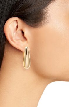 Perfect for the work day and beyond, these oval teardrop hoop earrings offer molten shine with a glossy goldtone or rhodium-plated finish. 1 1/2" hoop diameter Hinge with snap-post closure Goldtone plate or rhodium plate Imported Modern Oval Teardrop Earrings For Pierced Ears, Metal Teardrop Hoop Earrings, Gold-tone Teardrop Hoop Earrings, Nordstrom Gold Jewelry For Formal Occasions, Nordstrom Gold Formal Jewelry, Teardrop Hoop Earrings, Oval Hoop Earrings, Earrings In Gold, Fabric Gift Bags