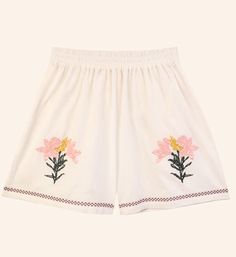 The caspia shorts have an elasticated gathered high waist with side and back pockets. finished with floral motif embroidery on the front of each leg and cross stitch running around the hem.    100% cotton. hand wash only.    model is 5'9" / 175 cm and is wearing a size uk 8.    worn with the penstemon shirt. Motif Embroidery, Caged Sandals, Black Tank Dress, Black Aviators, Prairie Style, Neon Purple, Boyfriend Tee, Engineered Garments, Ruched Dress